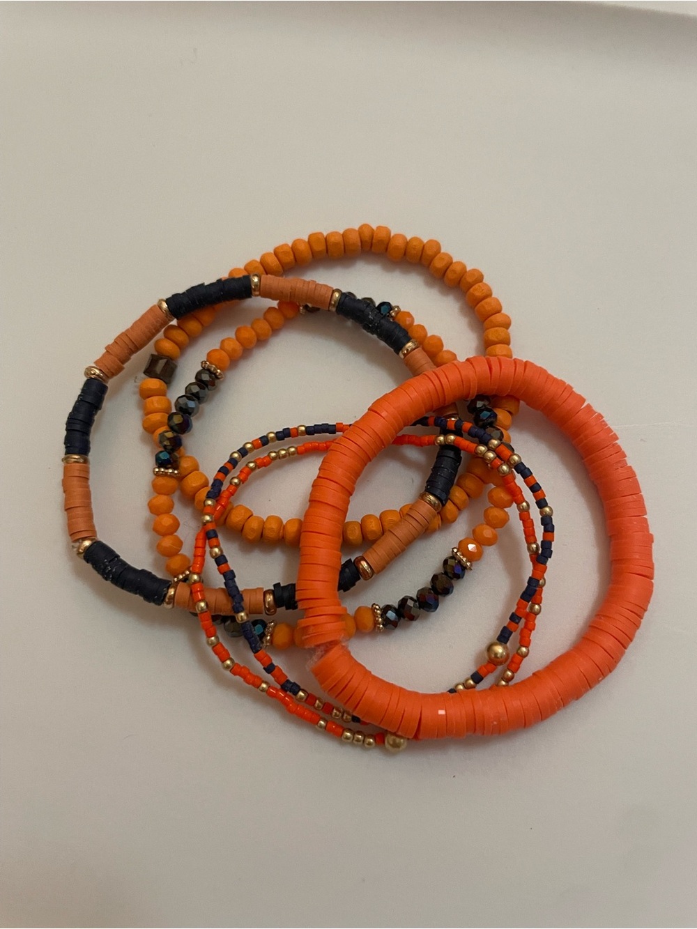 Blue and orange stack bracelet.